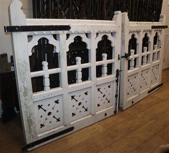 A pair of painted oak gates W.132cm each